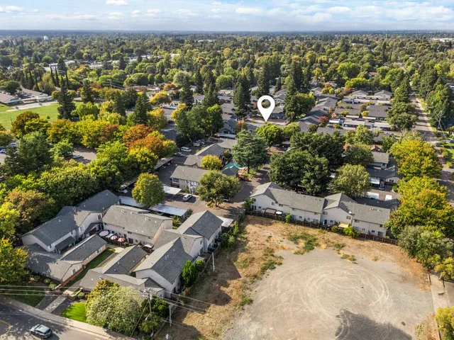 an aerial view of residential house with outdoor space