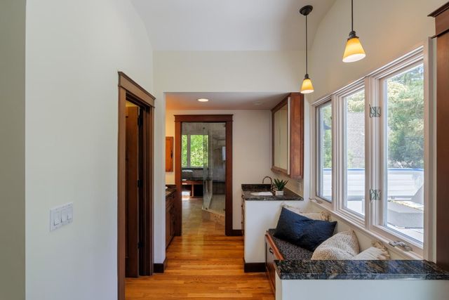 a view of living room filled with furniture and window