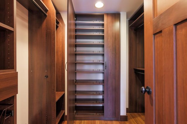 a view of closet area with empty racks