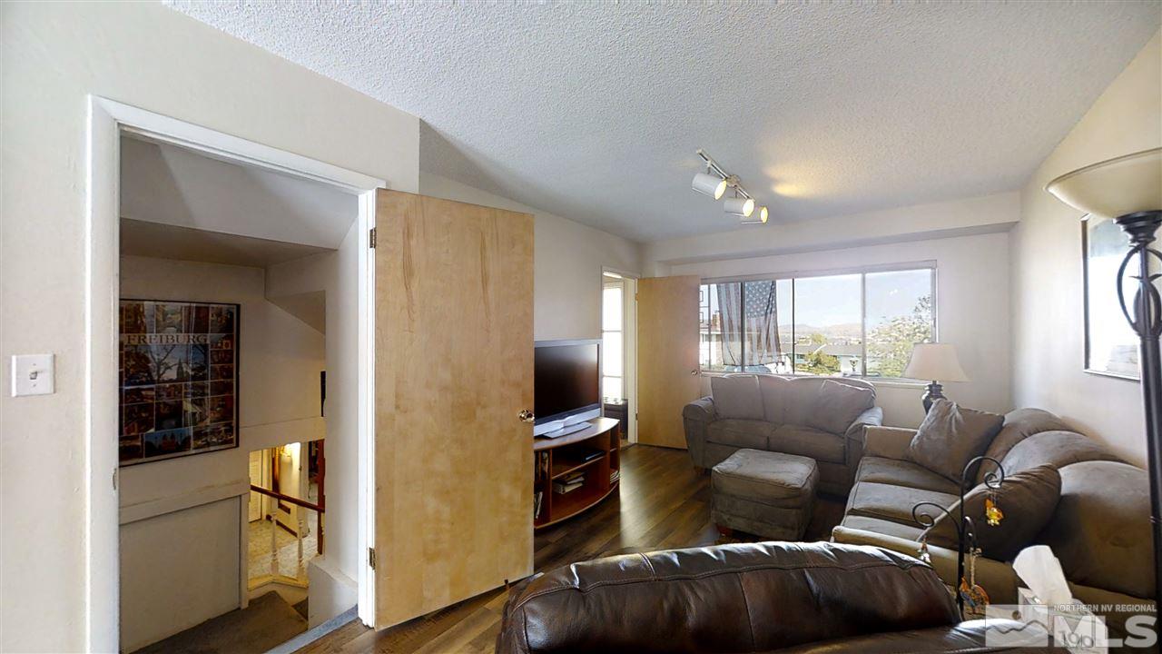 3333 Menlo Court Reno, NV 89509 - Photo 12 of 29 a living room with furniture and a flat screen tv