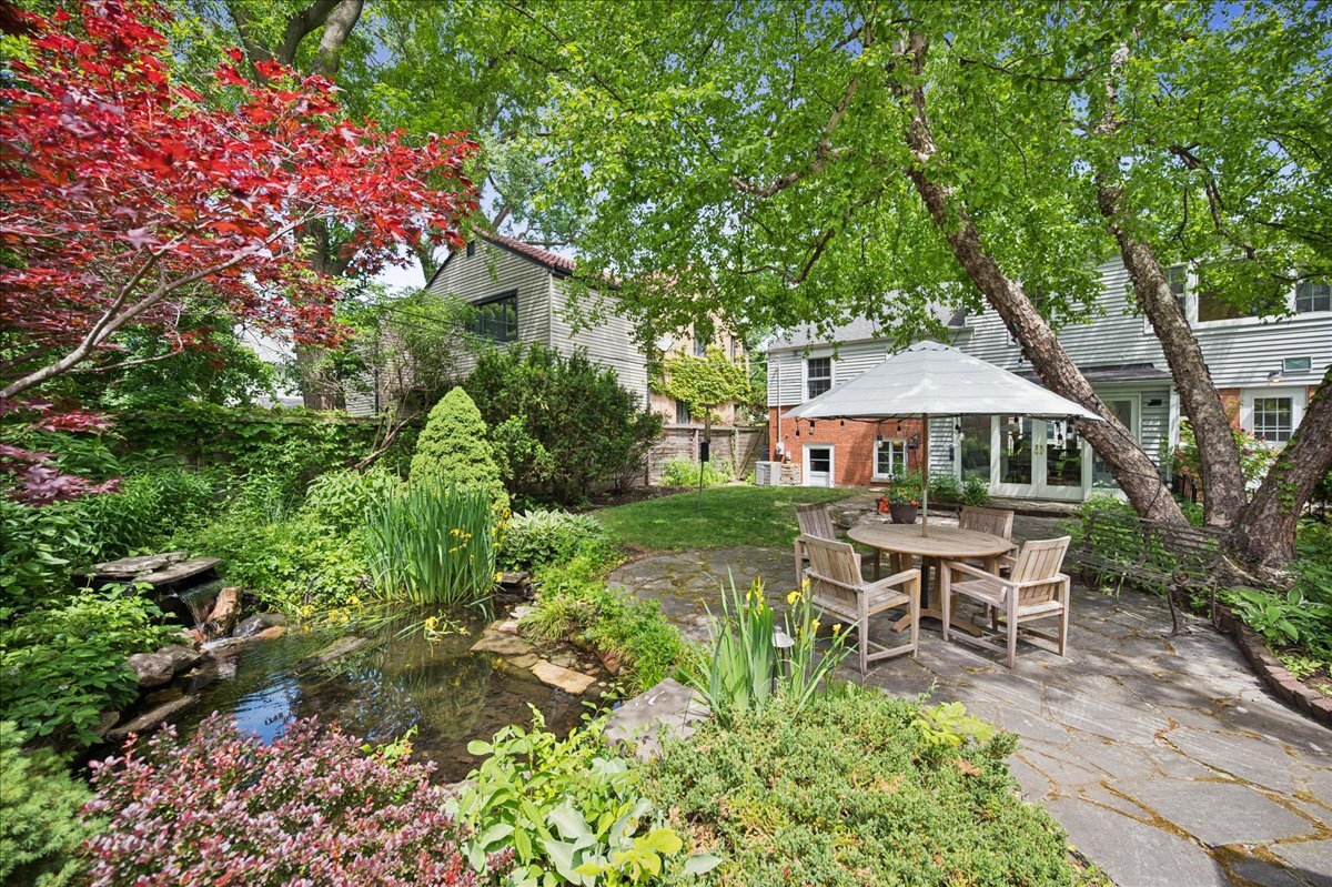 712 Juniper Road Glenview, IL 60025 - Photo 24 of 33 a view of a house with yard and sitting area