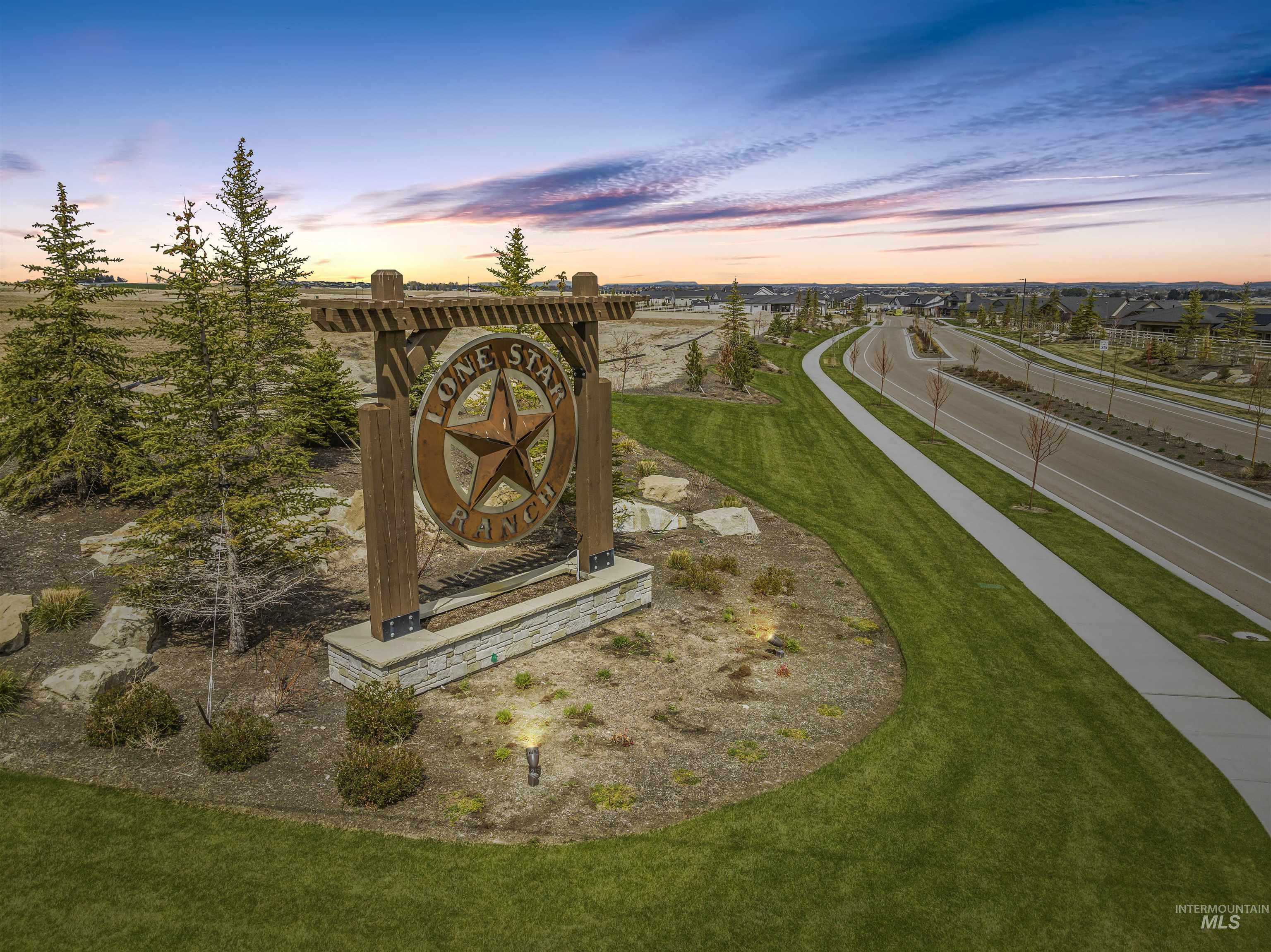 View of property's community featuring a yard