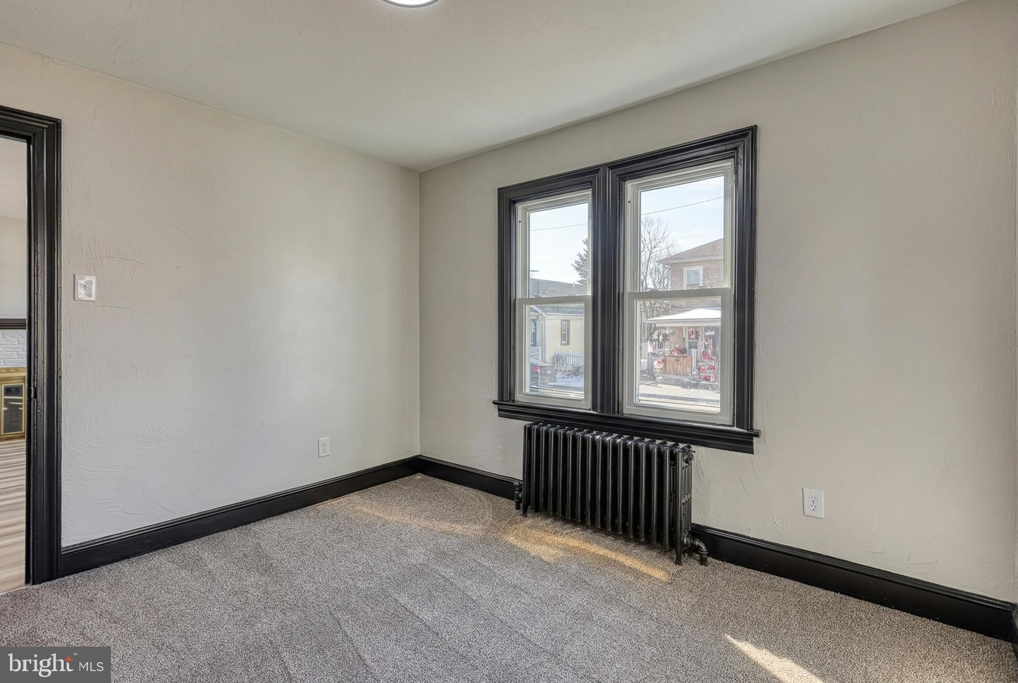 327 Norway Street York, PA 17403 - Photo 14 of 64 an empty room with windows