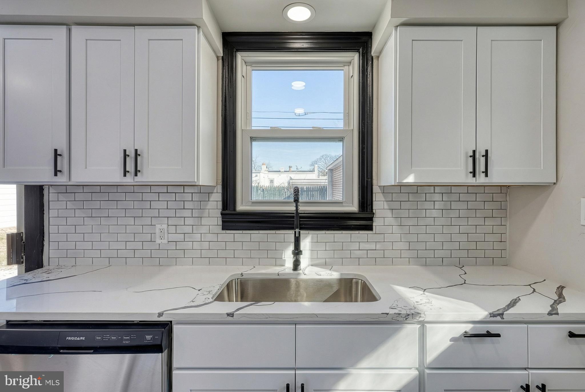 327 Norway Street York, PA 17403 - Photo 27 of 64 a kitchen with a sink and cabinets