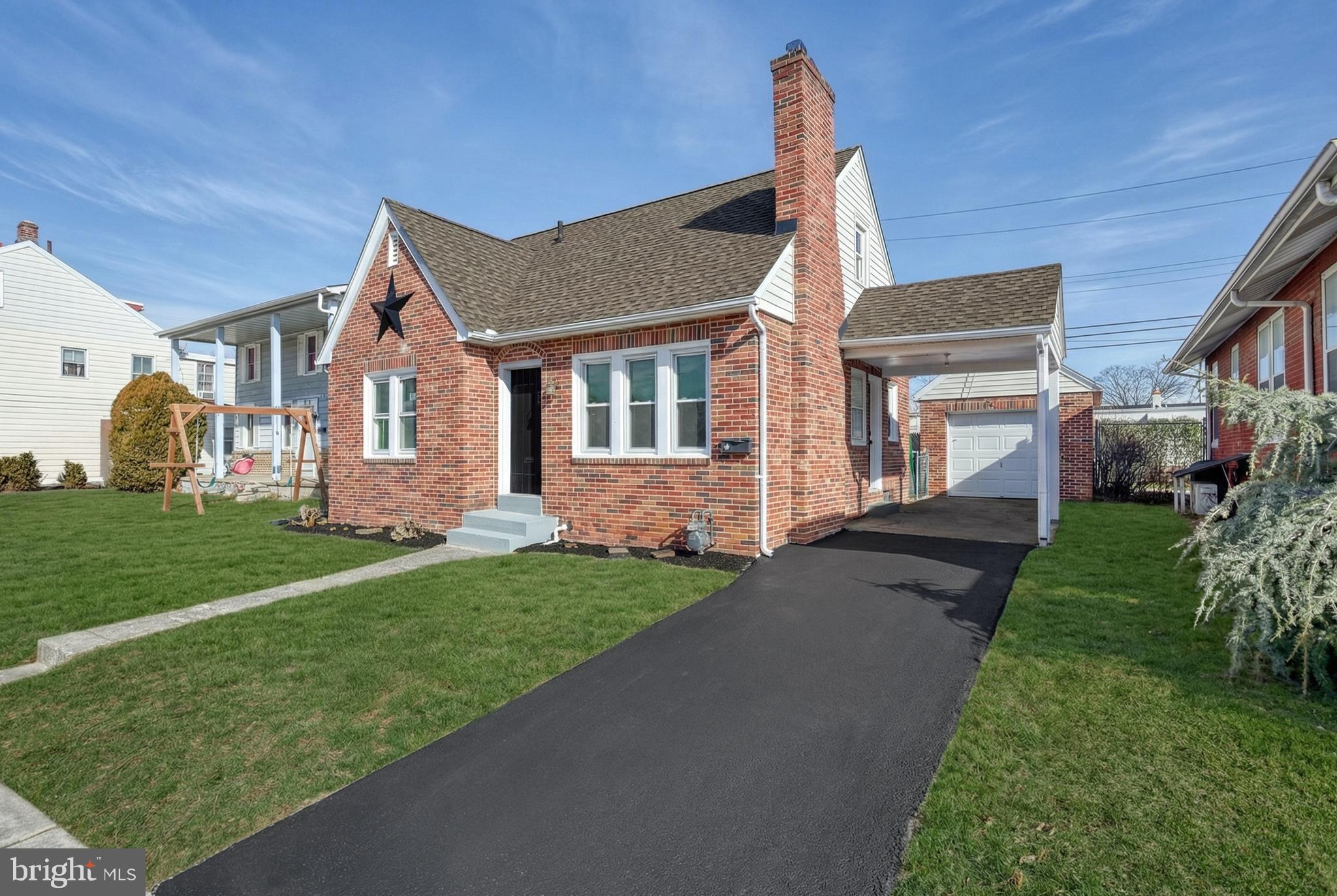 327 Norway Street York, PA 17403 - Photo 5 of 64 a front view of a house with garden