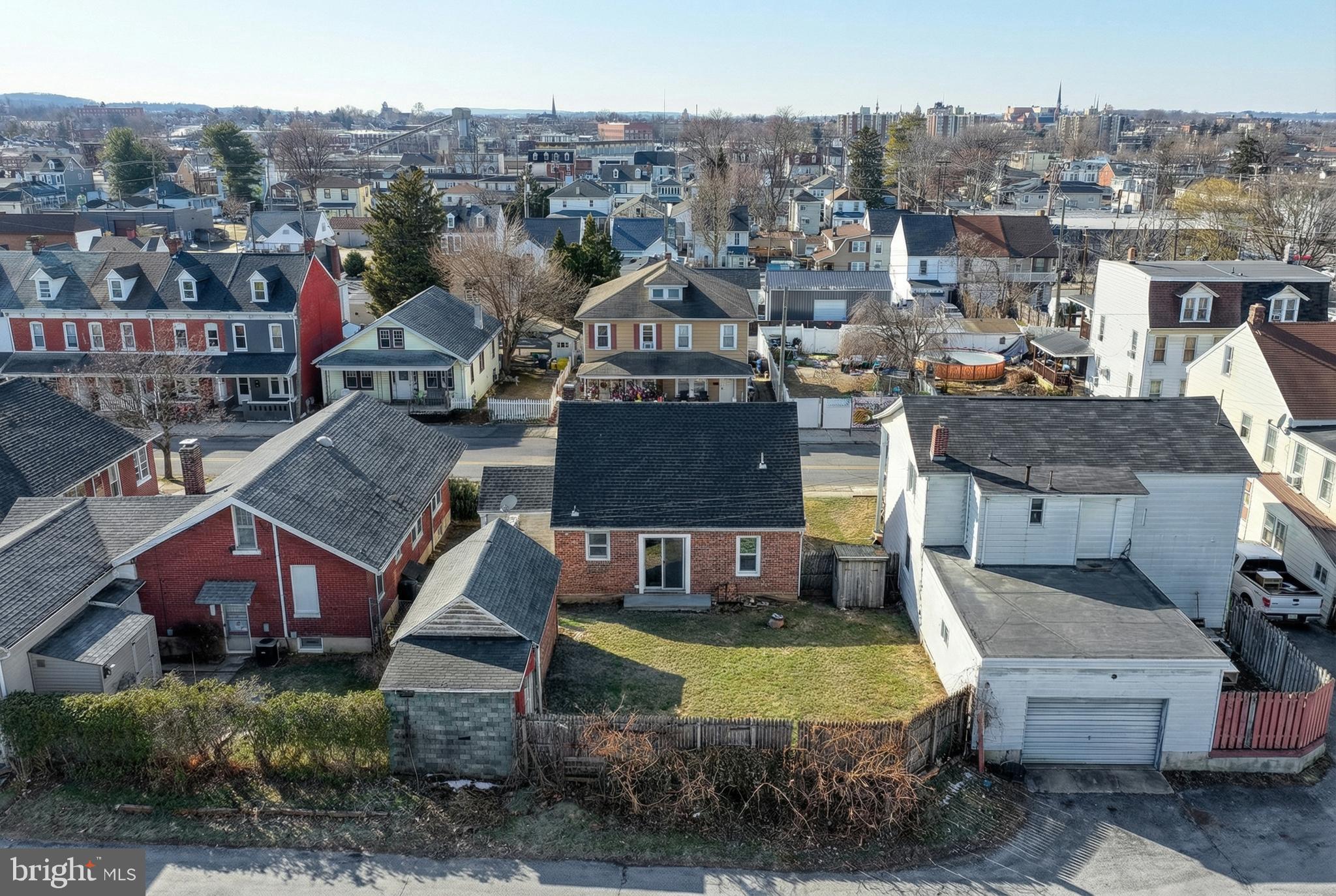 327 Norway Street York, PA 17403 - Photo 51 of 64 an aerial view of a house with a garden and lake view
