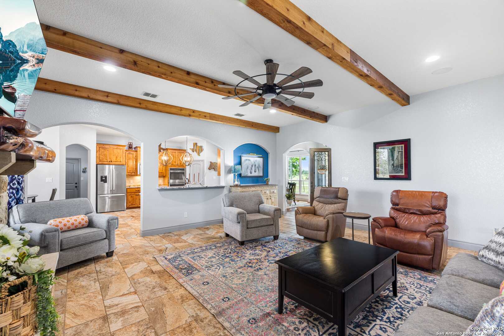 997 Kramer Road Harper, TX 78631 - Photo 13 of 45 a living room with furniture ceiling fan and a rug