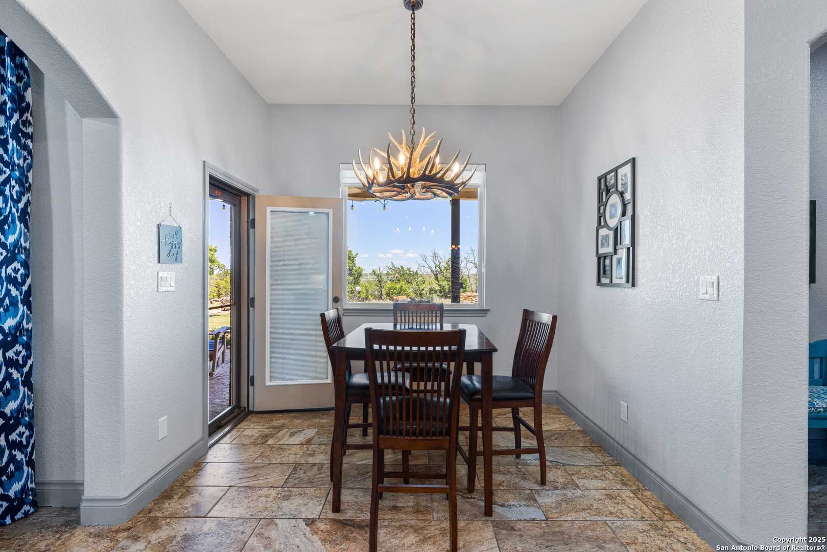 997 Kramer Road Harper, TX 78631 - Photo 16 of 45 a view of a dining room with furniture and window