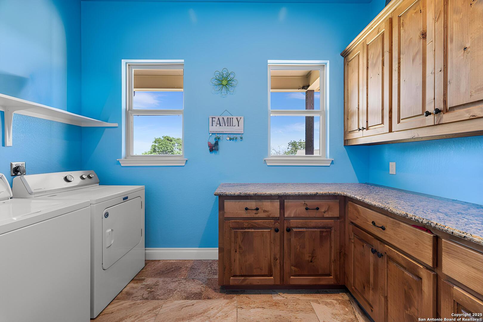997 Kramer Road Harper, TX 78631 - Photo 28 of 45 a utility room with dryer and washer