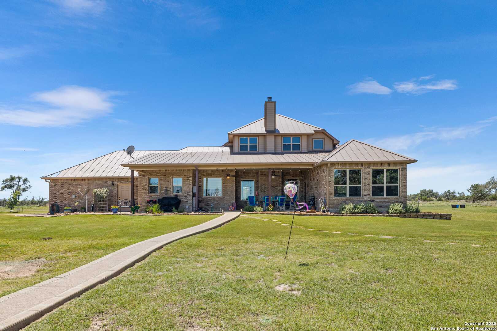 997 Kramer Road Harper, TX 78631 - Photo 29 of 45 a view of a house with a big yard