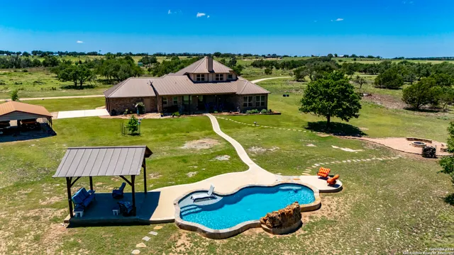 a view of a table and chairs in the patio