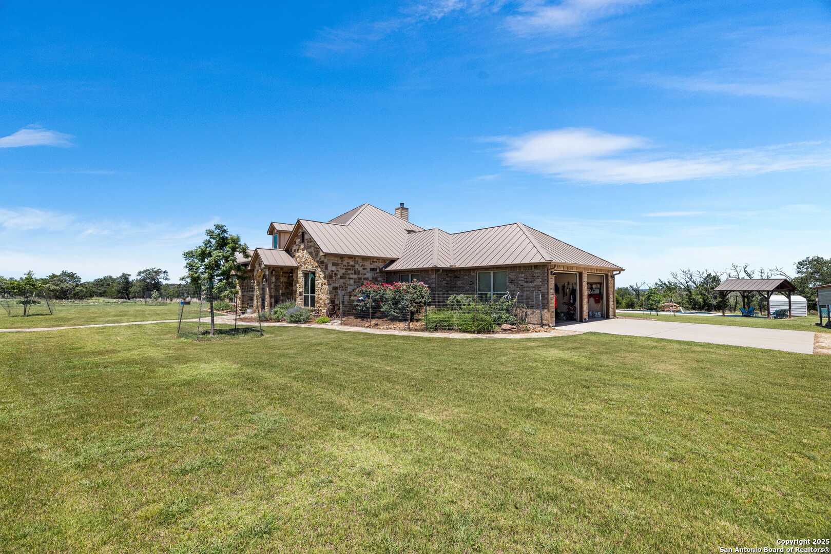 997 Kramer Road Harper, TX 78631 - Photo 44 of 45 a front view of a house with a yard