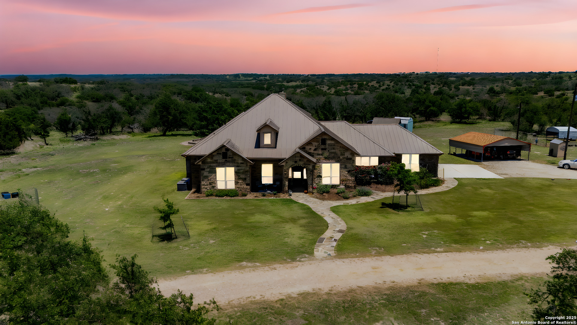 997 Kramer Road Harper, TX 78631 - Photo 7 of 45 a view of a big yard with large trees and plants
