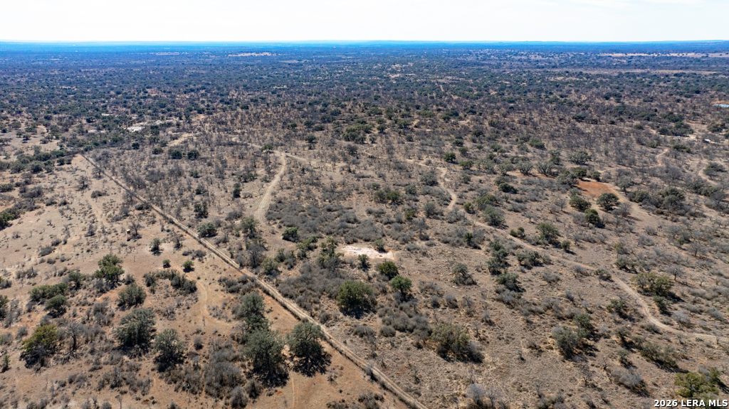 Tbd Hickory Grove Road Art, TX 76820 - Photo 25 of 27 an aerial view of house with yard and mountain view in back