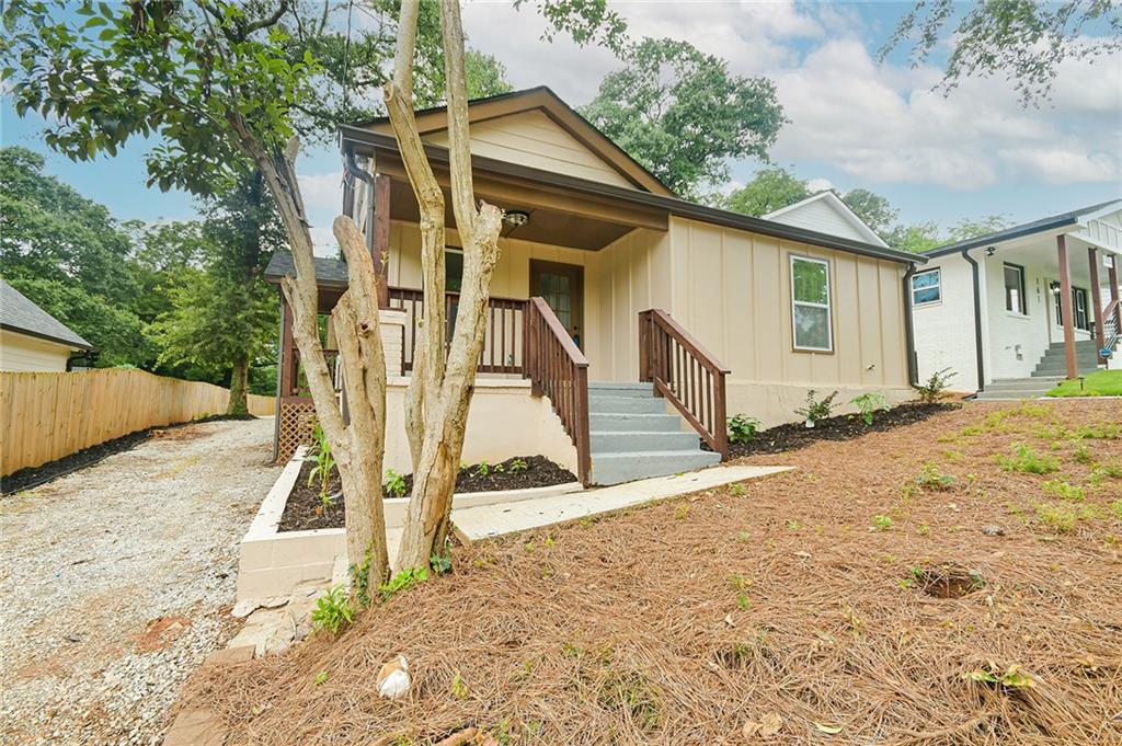 167 Racine Street Southwest Atlanta, GA 30314 - Photo 1 of 1 a house with trees in front of it
