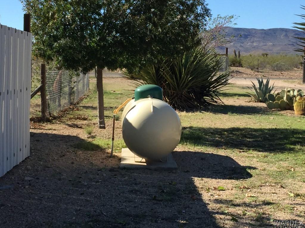3580 Egar Road Golden Valley, AZ 86413 - Photo 26 of 28 Gas is Propane Side Yard