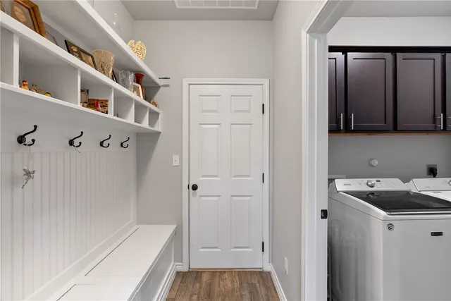 a bathroom with a tub and a sink