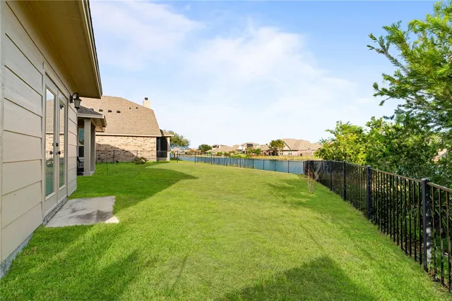 a view of a backyard with garden