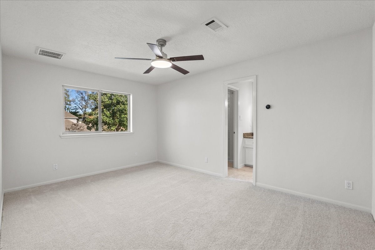 6702 Robinwick Court Spring, TX 77379 - Photo 28 of 41 a view of an empty room with a window