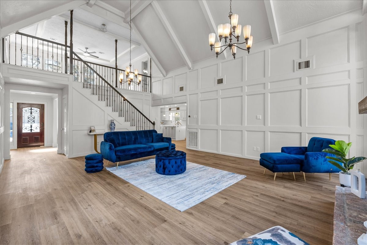 6702 Robinwick Court Spring, TX 77379 - Photo 6 of 41 a room with lots of furniture and wooden floor