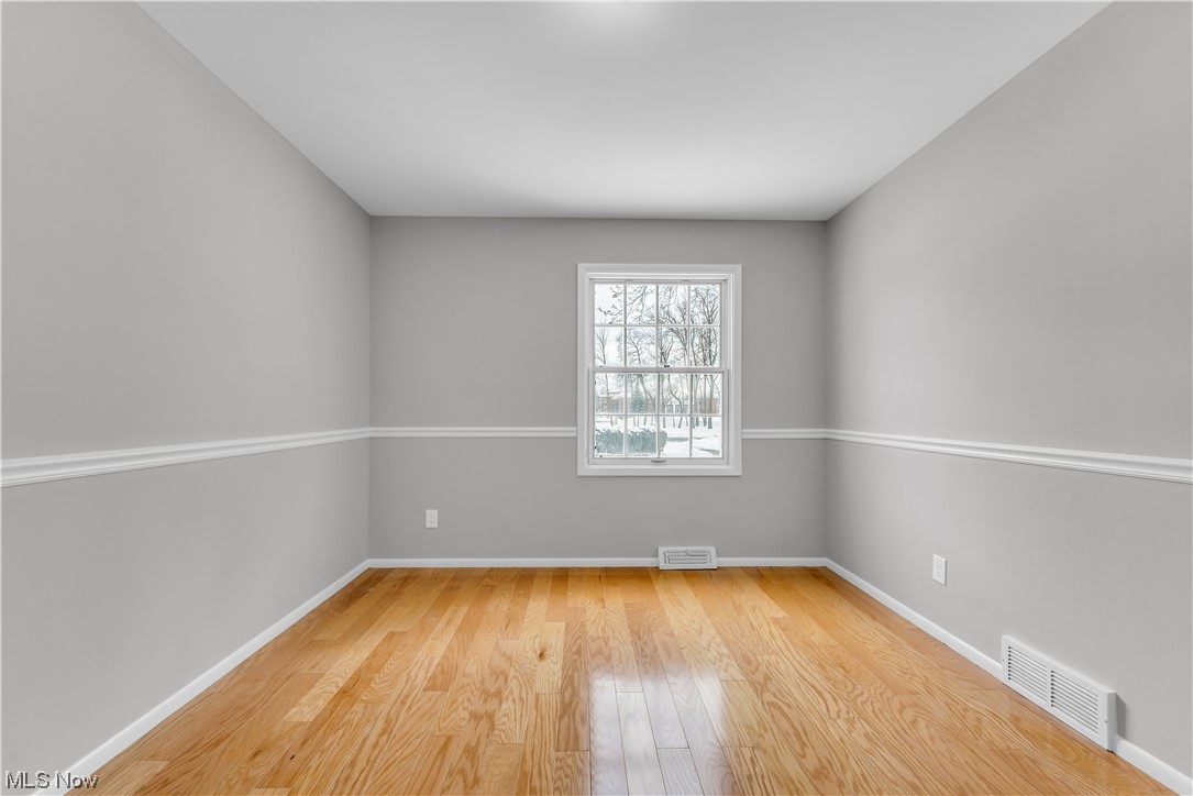 5025 Clubside Road Lyndhurst, OH 44124 - Photo 20 of 35 Spare room featuring light wood-type flooring
