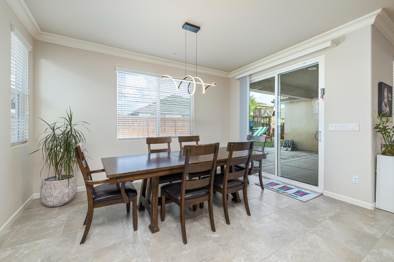 3573 Hermosa Avenue Clovis, CA 93619 - Photo 20 of 42 a view of a dining room with furniture and window