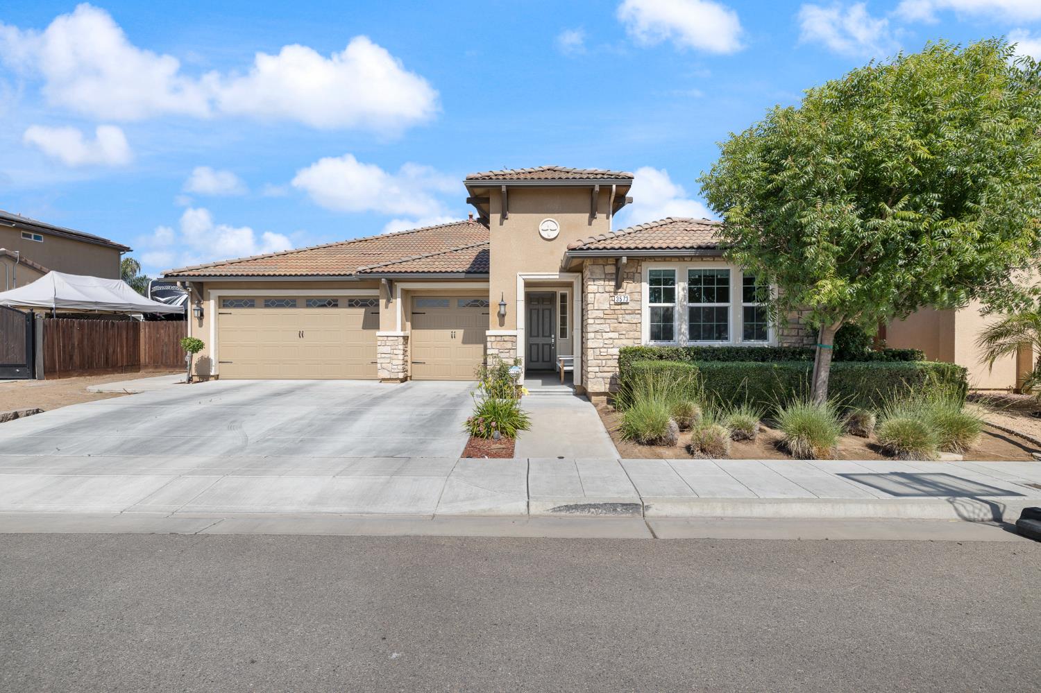 3573 Hermosa Avenue Clovis, CA 93619 - Photo 2 of 42 front view of house with a street
