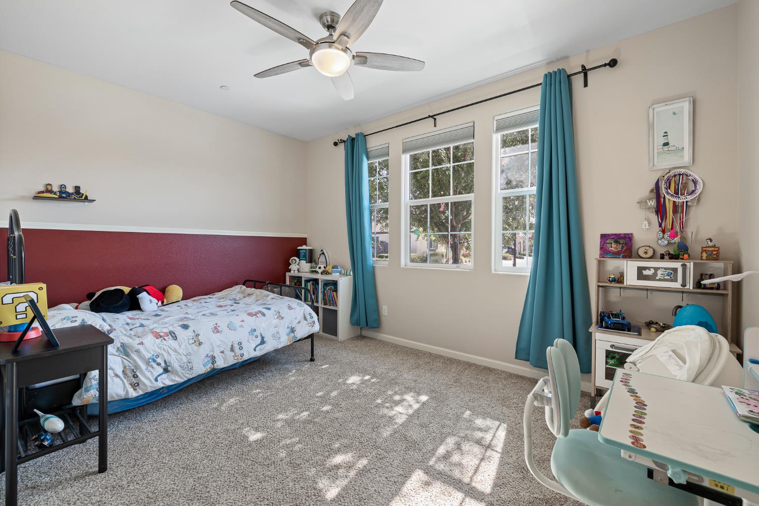 3573 Hermosa Avenue Clovis, CA 93619 - Photo 25 of 42 a bedroom with a bed and a window