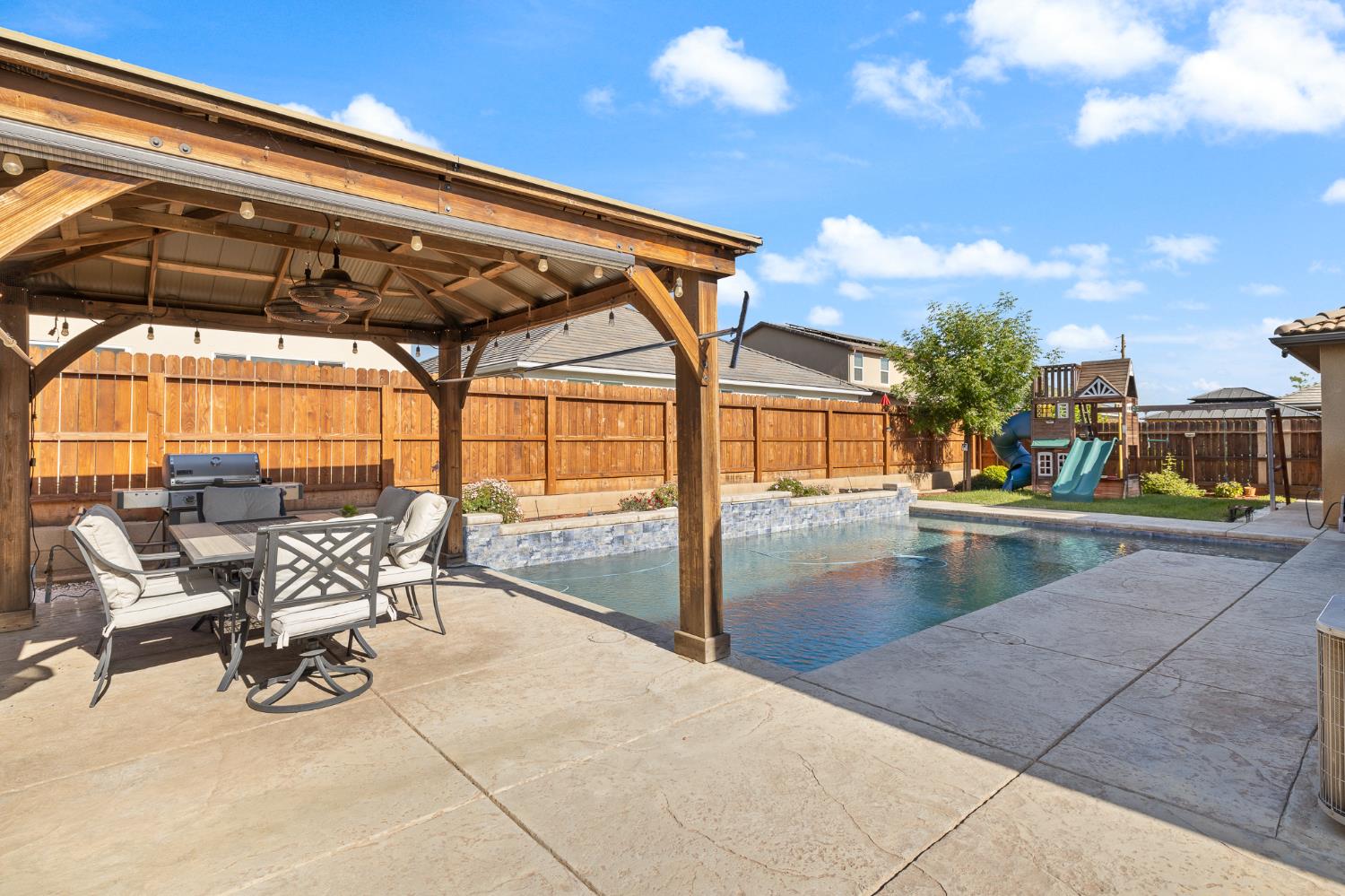 3573 Hermosa Avenue Clovis, CA 93619 - Photo 39 of 42 a view of swimming pool with outdoor seating
