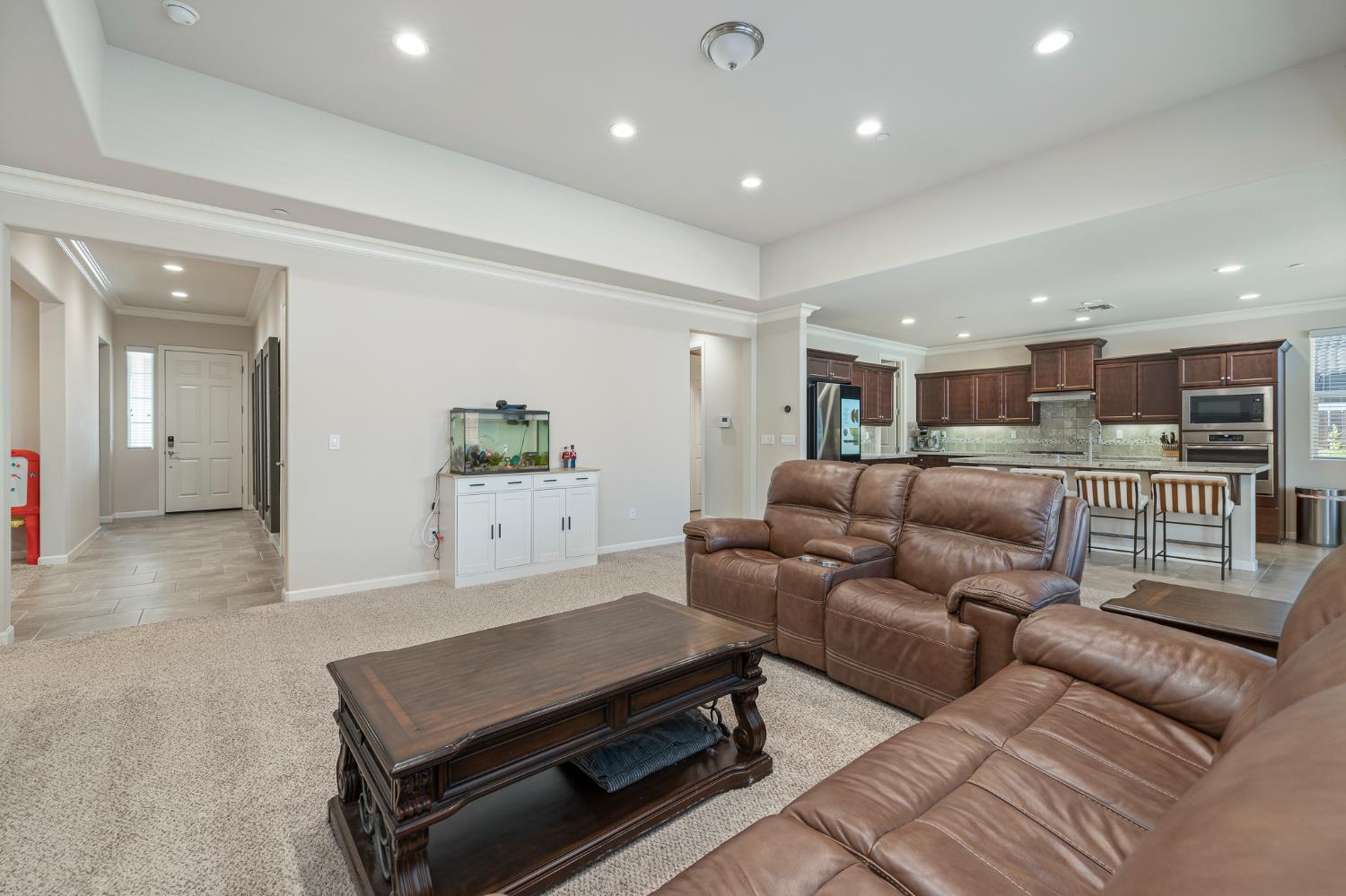3573 Hermosa Avenue Clovis, CA 93619 - Photo 8 of 42 a living room with furniture and kitchen view