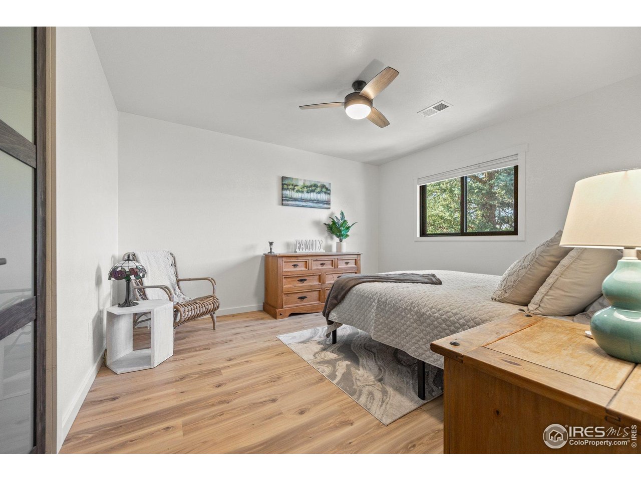 6969 Harvest Road Boulder, CO 80301 - Photo 18 of 39 a living room with furniture and a large window