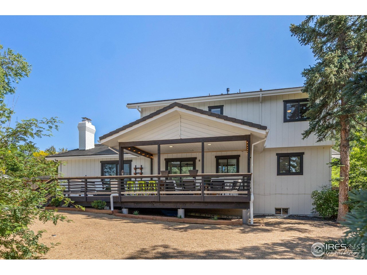 6969 Harvest Road Boulder, CO 80301 - Photo 26 of 39 a view of house with outdoor space and sitting area
