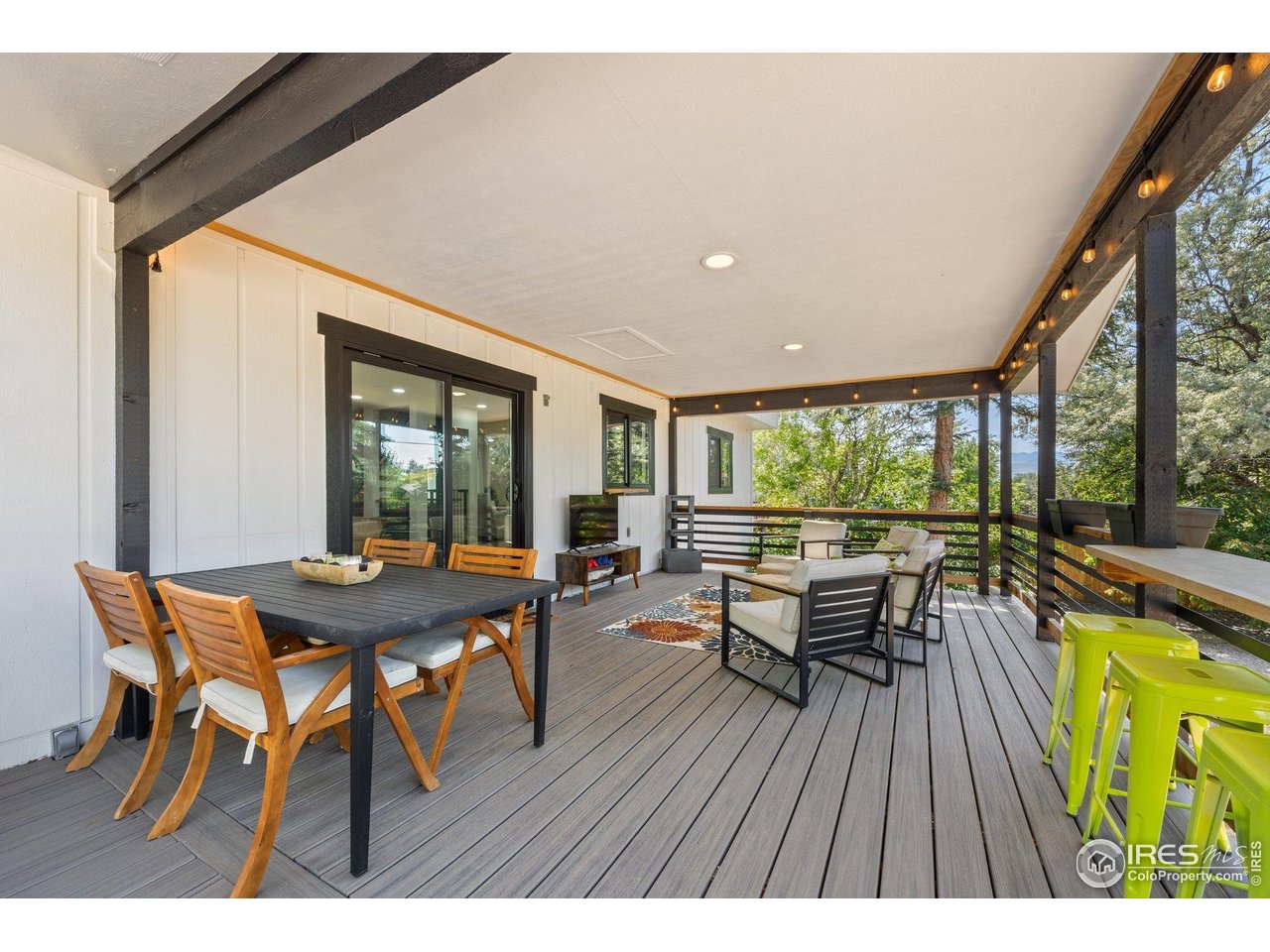 6969 Harvest Road Boulder, CO 80301 - Photo 30 of 39 a dining room with furniture and wooden floor