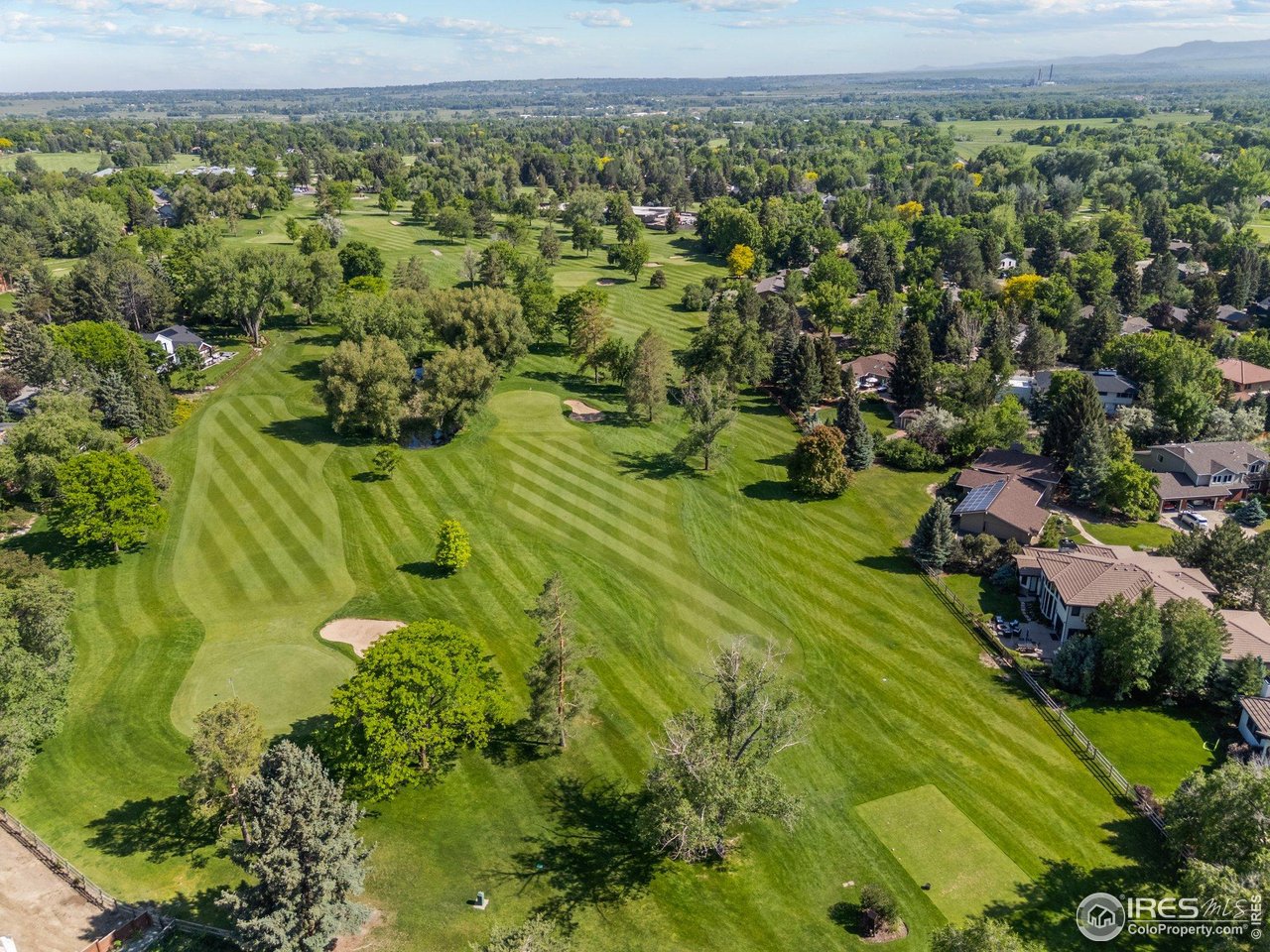 6969 Harvest Road Boulder, CO 80301 - Photo 35 of 39 a view of a garden with a building in the background