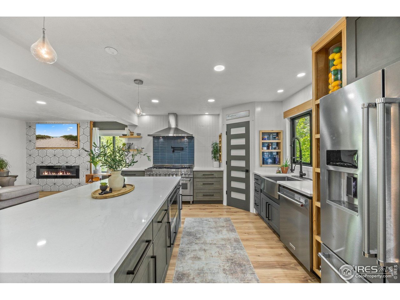6969 Harvest Road Boulder, CO 80301 - Photo 6 of 39 a kitchen with stainless steel appliances granite countertop a refrigerator and a sink
