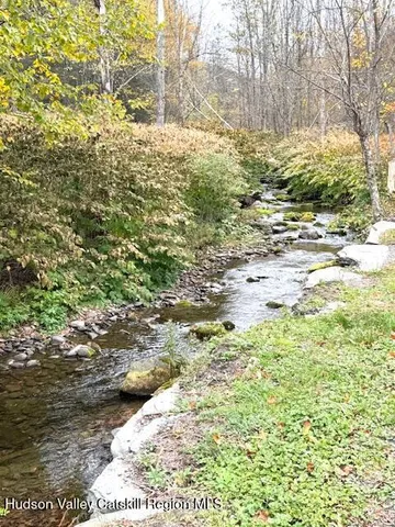 a view of beach and yard