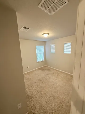 an empty room with a workbench