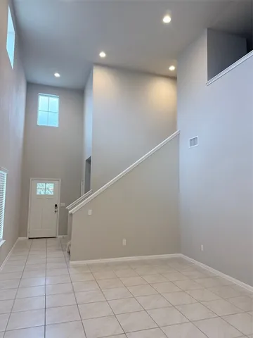 a kitchen with stainless steel appliances kitchen island granite countertop a sink and cabinets
