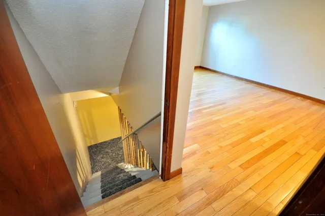 a view of balcony and wooden floor