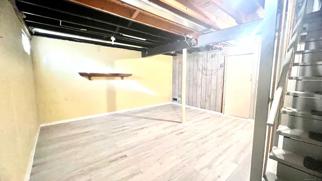 an outdoor space with patio and white umbrellas