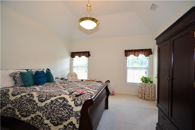 2011 Nealcrest Circle Spring Hill, TN 37174 - Photo 9 of 18 Master bedroom on main floor. Vaulted ceilings provide an elegant feel.