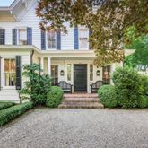 front view of a house with a garden