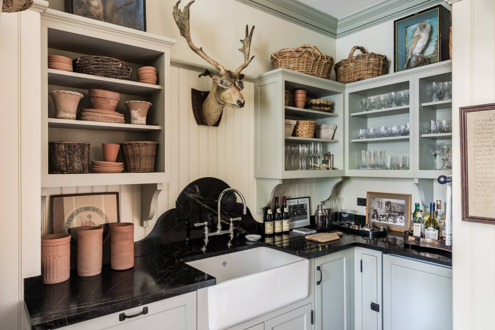 225 First Neck Lane Southampton, NY 11968 - Photo 11 of 32 a kitchen with a sink and cabinets