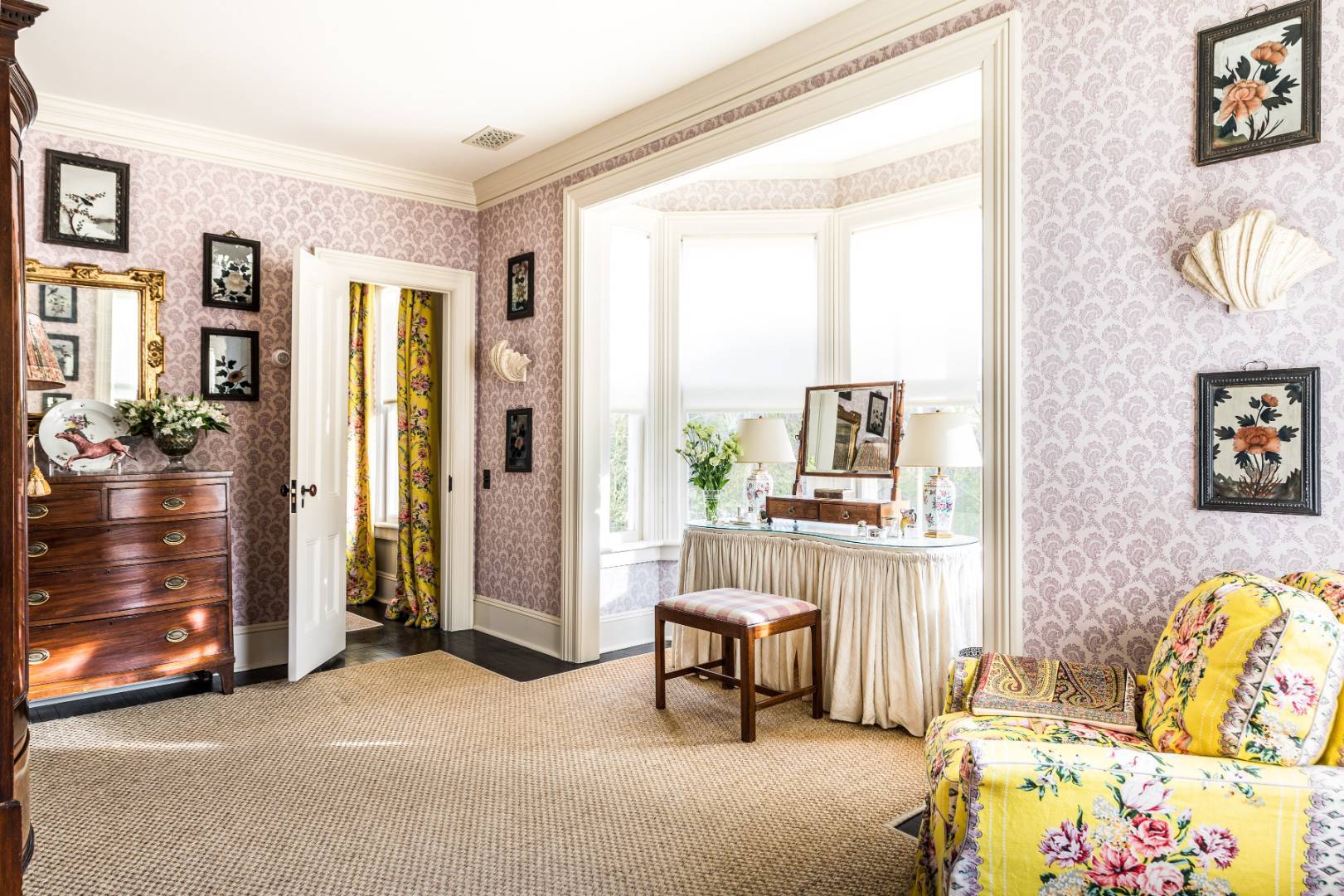 225 First Neck Lane Southampton, NY 11968 - Photo 19 of 32 a living room with furniture and a table