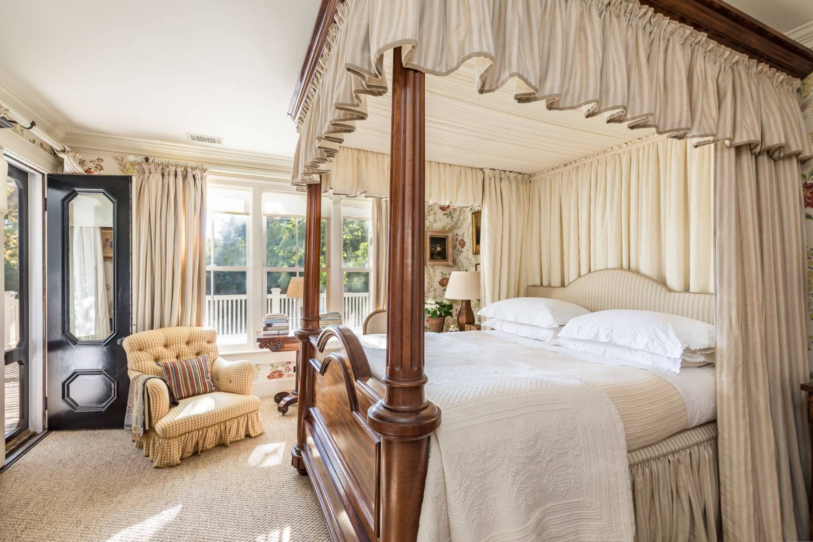 225 First Neck Lane Southampton, NY 11968 - Photo 21 of 32 a bedroom with furniture and a large window