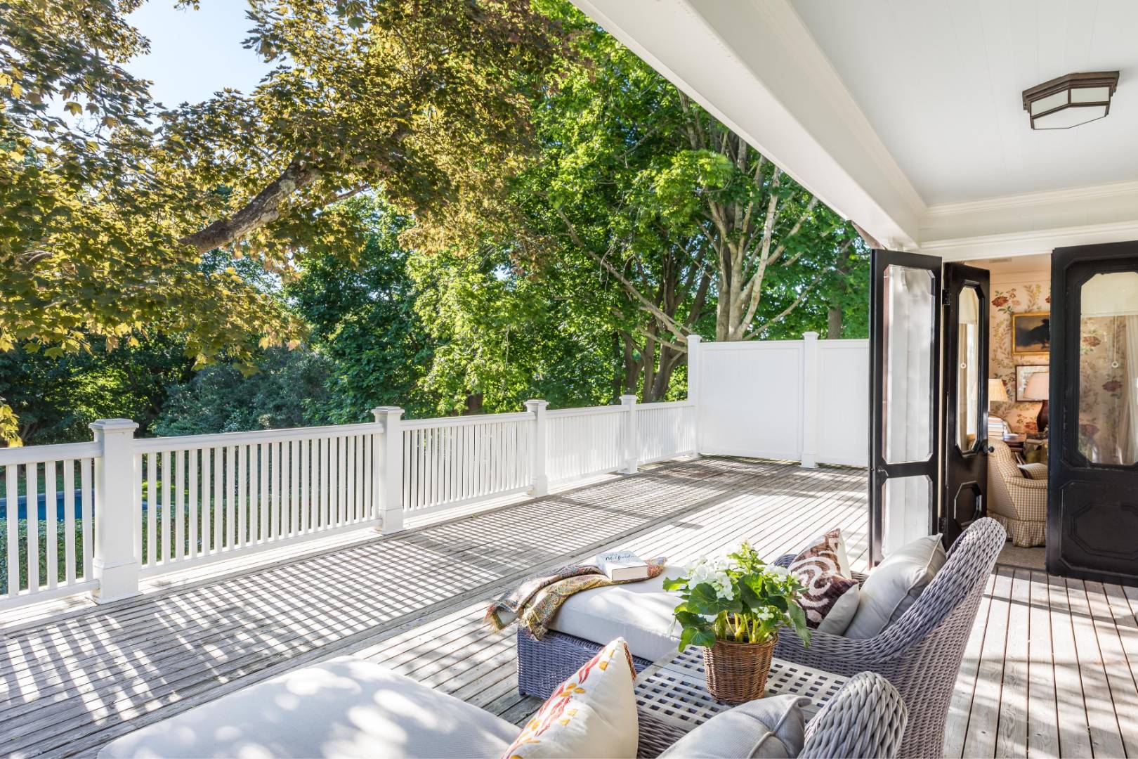 225 First Neck Lane Southampton, NY 11968 - Photo 22 of 32 a view of backyard with a patio and wooden flooring