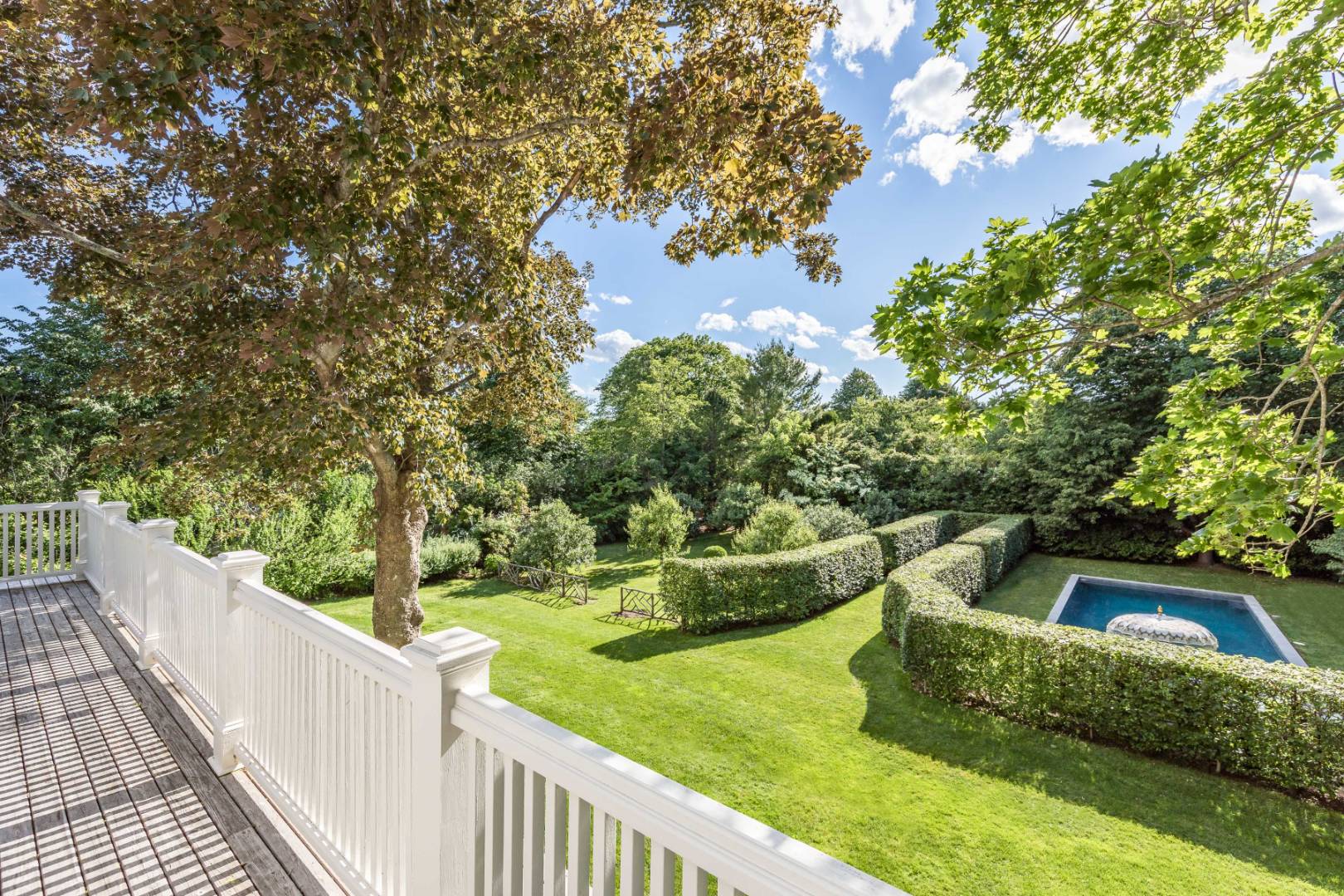 225 First Neck Lane Southampton, NY 11968 - Photo 23 of 32 a view of a yard from a balcony