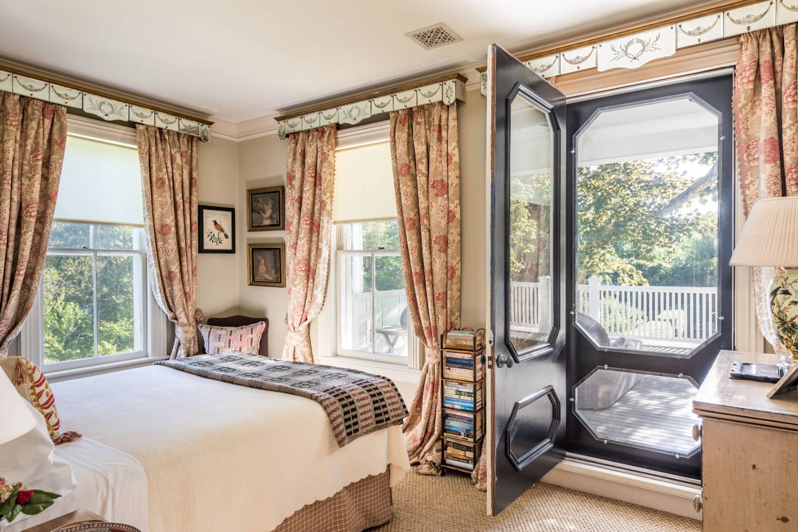 225 First Neck Lane Southampton, NY 11968 - Photo 24 of 32 a bedroom with a bed and a window