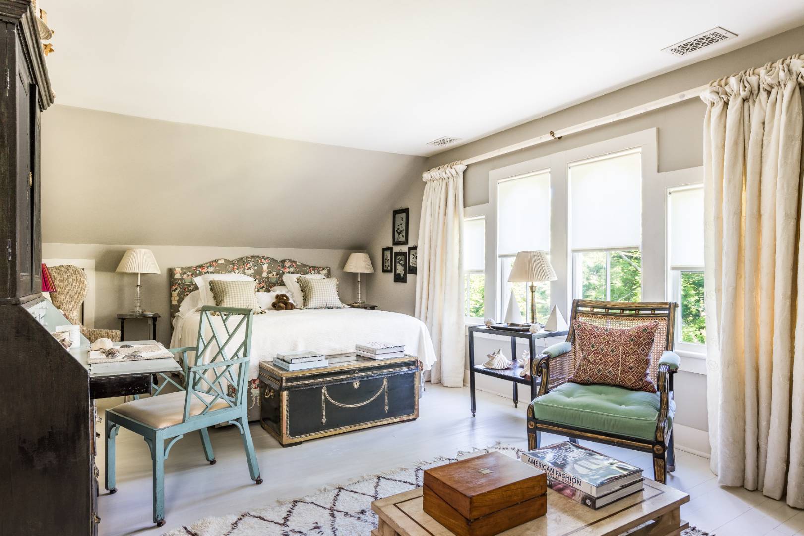 225 First Neck Lane Southampton, NY 11968 - Photo 30 of 32 a bedroom with a bed and a chair