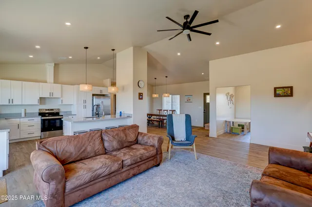 a view of a mountain with a snow in the background